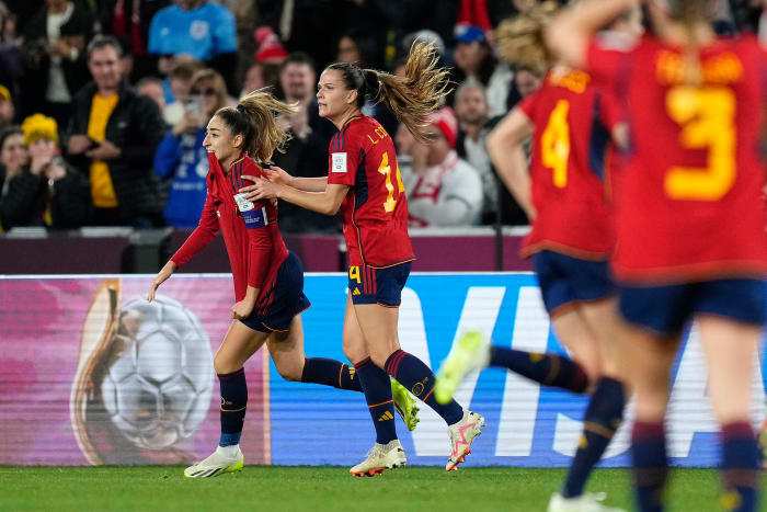 Spain's players pictured celebrating during the 2023 FIFA Women's World Cup final after a goal scored by Olga Carmona (left)